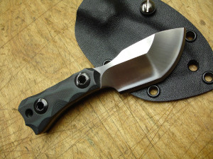 Im having black G10 handles, and a partialy serated edge. I went ...