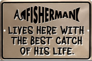 Fisherman Lives Here With The Best Catch Of His Life Tin Sign