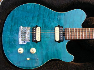 This one most accurately captures the True Color of the guitar.