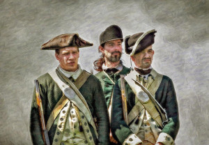Three Loyalist soldiers in their green uniforms