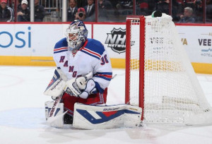 Goaltender Henrik Lundqvist of the Rangers makes save on the shot from ...