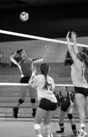 Freshman middle hitter Sara Gaughan aiming through Clackamas defense ...