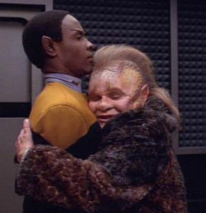 Are Spock's ears like that because he's half human? Tuvok's ears don't ...
