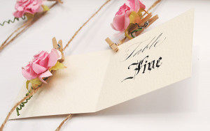 Beautiful little escort cards in calligraphy scripts old and new!
