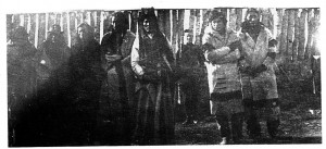 Poundmaker is standing in the center. Left of him is Yellow Mud ...