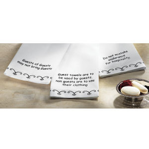 hand towels for guest use. At the bottom of each towel were sayings ...