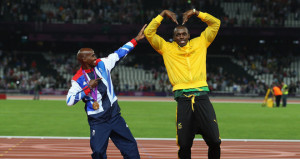 Farah and Bolt exchange poses on the podium