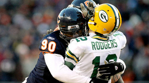 Bears DE Julius Peppers and Packers QB Aaron Rodgers embrace after ...
