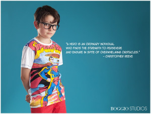 nerdy kid in superman tshirt with Christopher Reeve quote