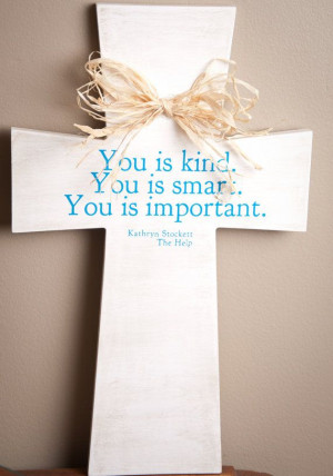 White, distressed, large wood cross w/ raffia bow. 