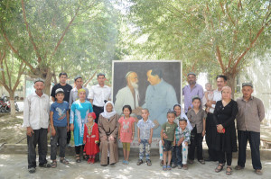 children and grandchildren of uncle kurban pose in front of a giant ...