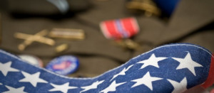 American flag and WWII veterans uniform.