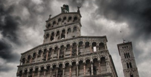 8156825-church-facade-in-lucca-with-bad-weather-background-italy