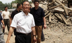 Wen Jiabao in a Sichuan township after the 2008 earthquake. Images of ...