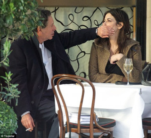 ... his wife Nigella Lawson on Saturday as they enjoyed a meal in London
