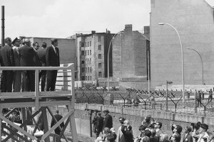 ... Berlin across the Berlin Wall, which divided the German city. AP Photo