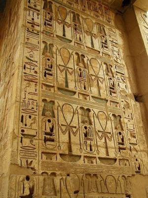 Egyptian hieroglyphics at Medinet Habu. Medinet Habu is the name ...