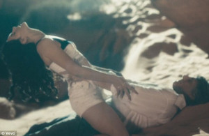 Easy tiger! Lana Del Rey gets physical with male co-star in epic 10 ...