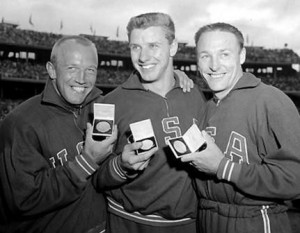 Al Oerter (centre) with other medallists Fortune Gordien and Desmond ...