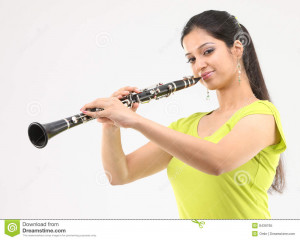 Playing Clarinet Lady playing clarinet Royalty