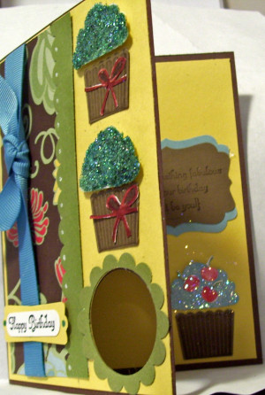 In this view you see the peek-a-boo window and the cupcake on the ...