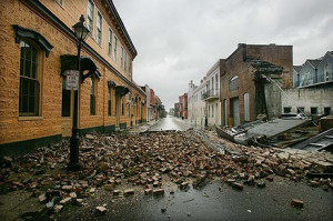 Geographic: A toppled brick wall is seen in the French Quarter ...