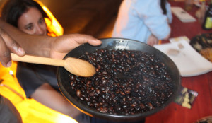 Stove-top roasted coffee beans being prepared for the coffee ceremony.