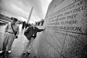 Ashhurst, left, and James Mills pause near the inscription of a quote ...