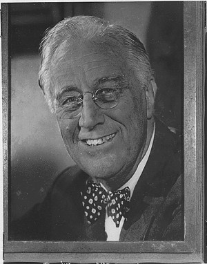 ... Roosevelt wearing glasses and a bow tie, photo taken in 1944