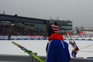 Biathlon staff cheer Sara Studebaker around the penalty loop at ...