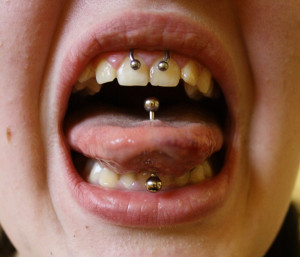 Tongue Smiley Piercing Tongue piercing by fortress-