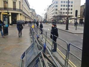 Police struggle to control the emotional crowds outside Charing Cross ...
