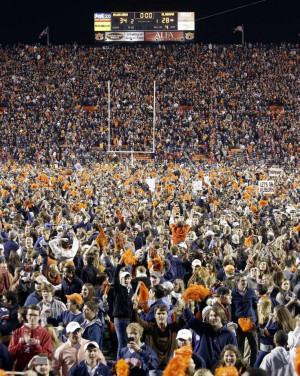 Auburn fans storm the field after their 34-28 after a win over top ...
