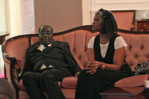wife Grace, right, at state house in Harare. She has expensive tastes ...