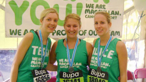 Team Macmillan runners Tessa, Alice and friend in the charity tent ...
