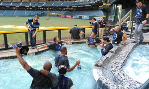 The Dodgers celebrate in the Arizona Diamondbacks' pool after winning ...