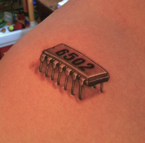 cool geek stuff inspired 6502 chip tattoo on shoulder