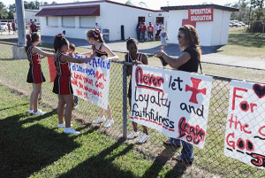 ... -Christians Join Protest Against Texas Cheerleaders’ Bible Banners