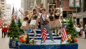 Ferris jumps on a float and sings “Danke Schoen” and “Twist and ...