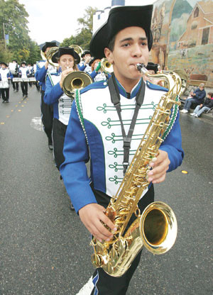 Willis plays his tenor sax with the Liberty High School Marching Band ...