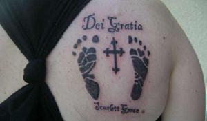 Baby footprints on mama Baby tattoos