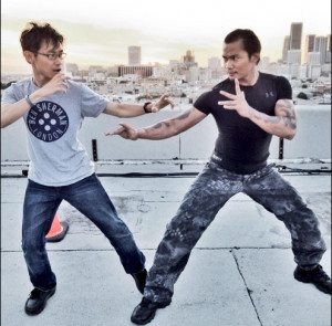 Director James Wan and actor Tony Jaa in a wrap shot from 'Fast and ...