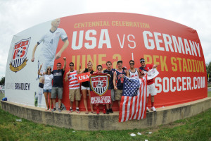 Soccer fans mount in front of a ensign before a U.S. men’s ...