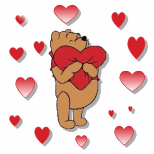 Winnie the Pooh is hugging hearts for Valentiens Day.