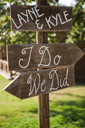 ... ceremony and reception locations with this DIY “I Do/We Did” sign
