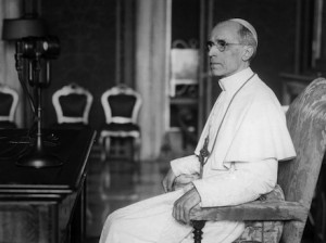 Pope Pius XII prepares to give a radio address in 1943 (CNS)