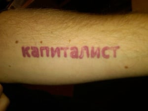 at Trader Joe's, and he has this tattoo on his arm: it's the Russian ...