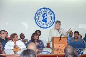 ... Show; Karen Gilkey, Allstate and the scholarship recipients look on