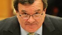 Finance Minister Jim Flaherty arrives before the finance committee on ...