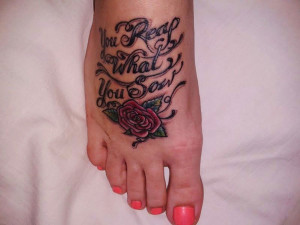 Rose Flower And Quote Tattoo On Girl Right Foot